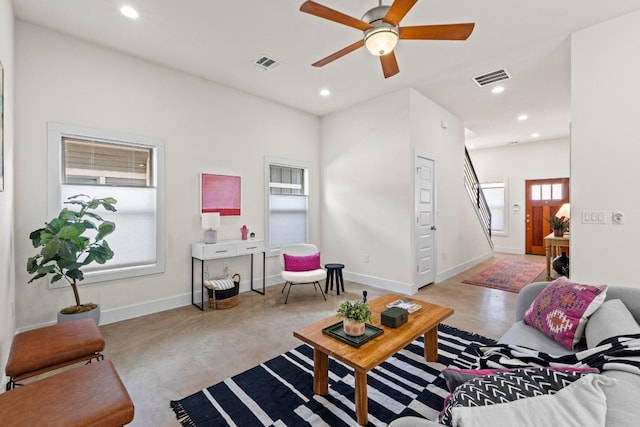 living room featuring baseboards, recessed lighting, visible vents, and ceiling fan