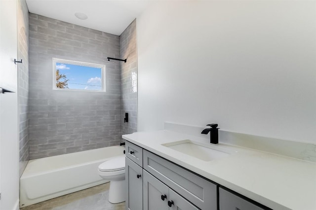 full bath featuring vanity, shower / tub combination, and toilet