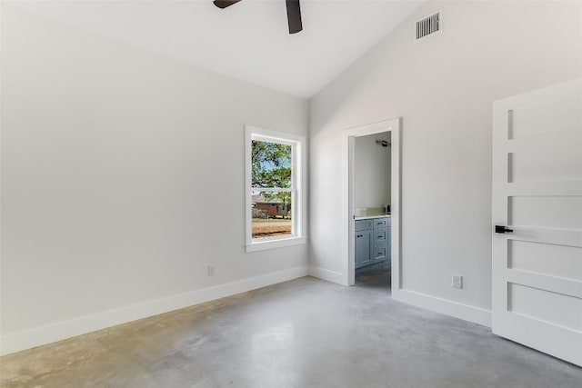 unfurnished bedroom featuring finished concrete flooring, high vaulted ceiling, baseboards, and visible vents