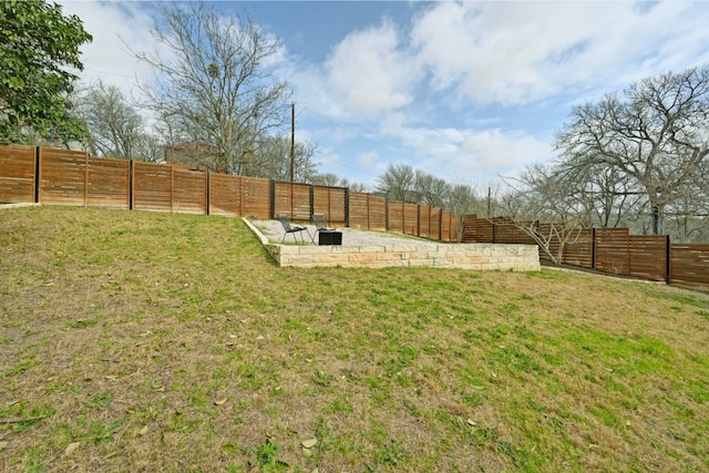 view of yard with a fenced backyard