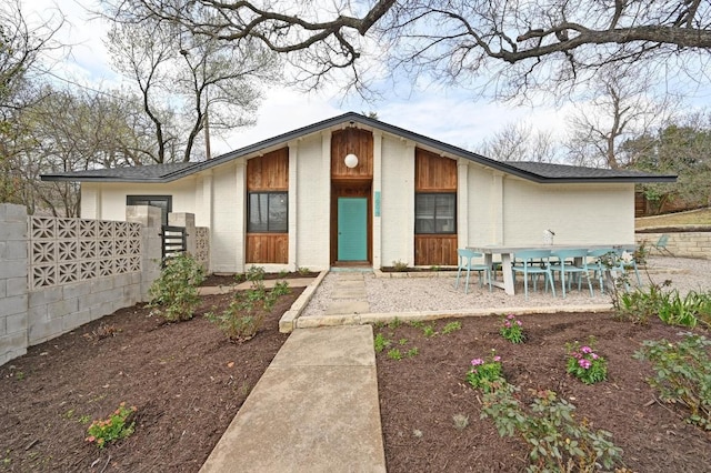 exterior space with brick siding