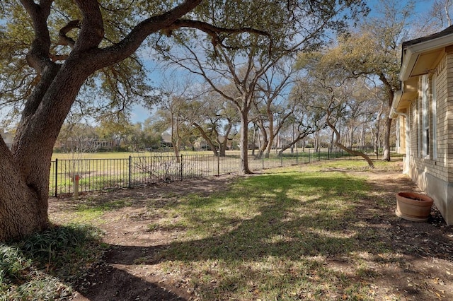 view of yard featuring fence