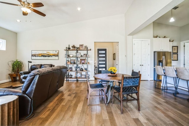 dining space with visible vents, recessed lighting, ceiling fan, and wood finished floors