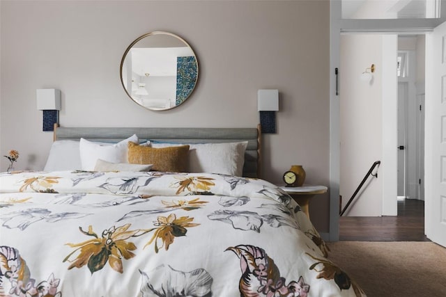 bedroom featuring wood finished floors