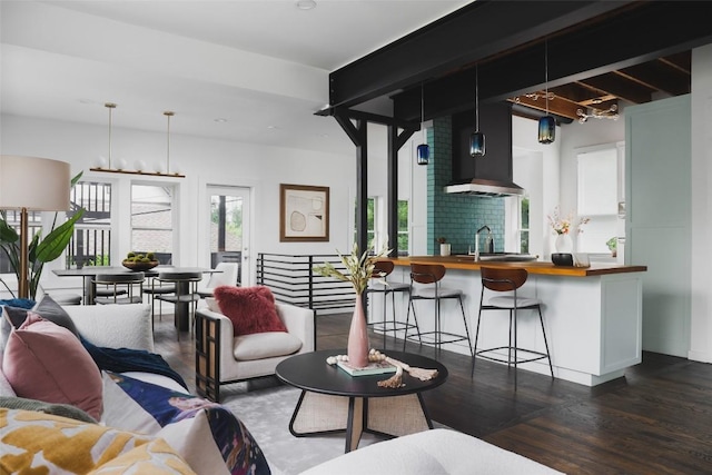 living room featuring dark wood-style flooring