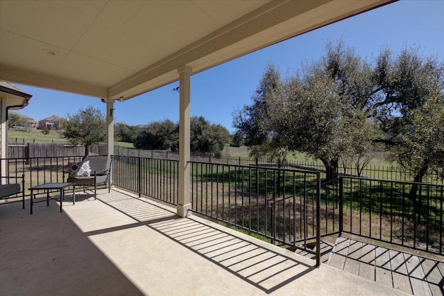 view of patio with fence