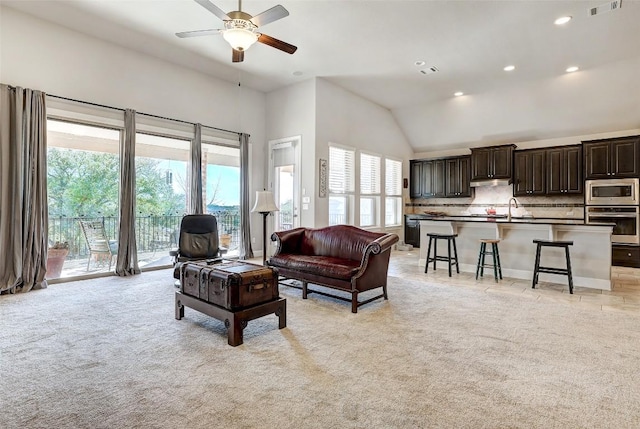 114 Angela Rose Ct, Austin, TX 78737 - living room featuring ceiling fan, light carpet, recessed lighting, and high vaulted ceiling