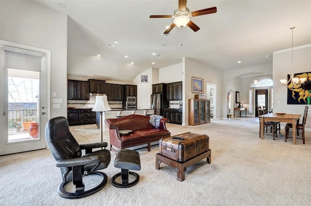 114 Angela Rose Ct, Austin, TX 78737 - living area featuring light carpet, a chandelier, a ceiling fan, arched walkways, and lofted ceiling