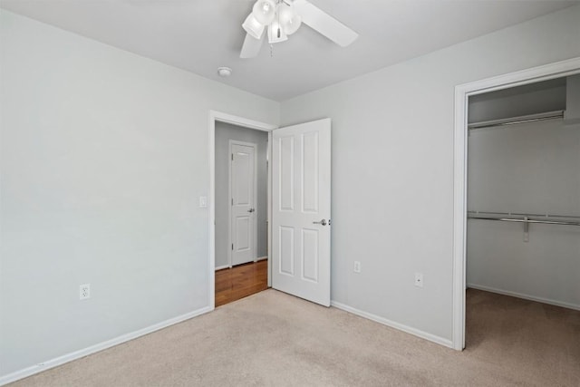 316 Barrington Farm Ct, Georgetown, TX 78633 - unfurnished bedroom with a closet, carpet flooring, ceiling fan, and baseboards