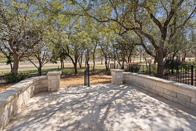 exterior space featuring a patio area and fence