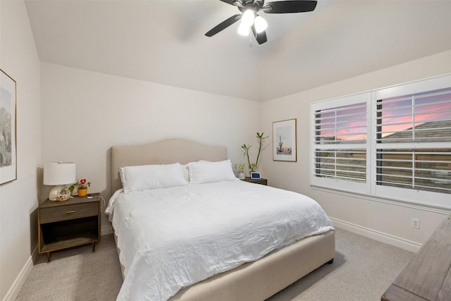 bedroom featuring ceiling fan, lofted ceiling, baseboards, and carpet floors