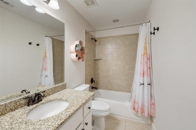 full bathroom with tile patterned floors, toilet, shower / bath combo, and visible vents