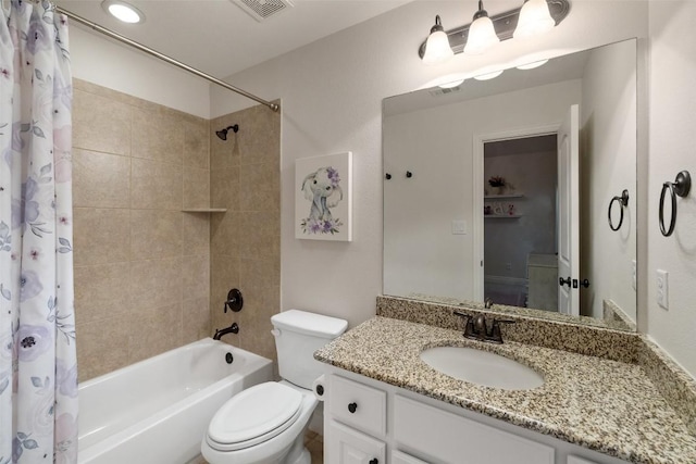 full bathroom with visible vents, toilet, and shower / bath combo with shower curtain