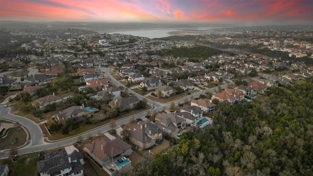 aerial view at dusk with a residential view