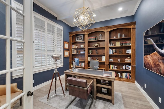 home office featuring an inviting chandelier, light wood-style flooring, baseboards, and ornamental molding