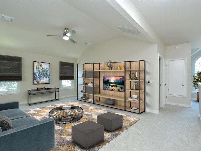 living area featuring vaulted ceiling, carpet flooring, visible vents, and ceiling fan