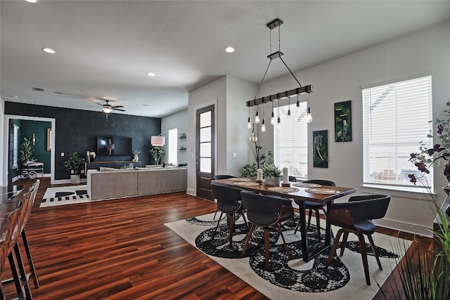 dining area with a ceiling fan, recessed lighting, wood finished floors, and baseboards