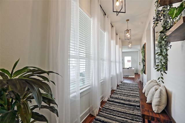 hall featuring wood finished floors