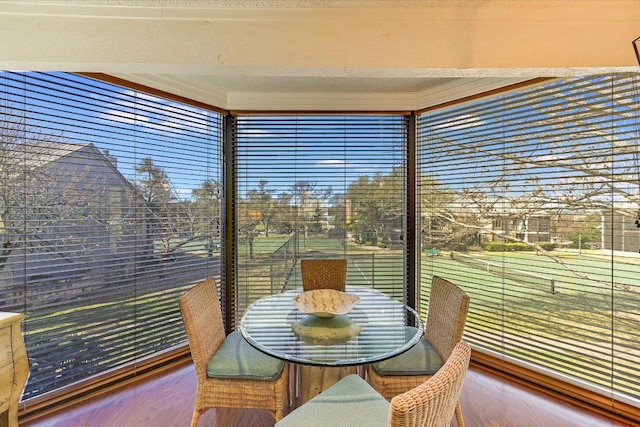 sunroom featuring a healthy amount of sunlight