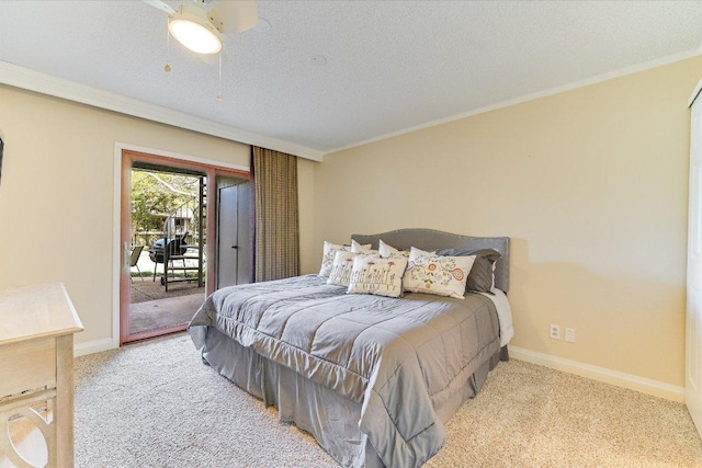 bedroom featuring baseboards, a textured ceiling, carpet, and access to outside