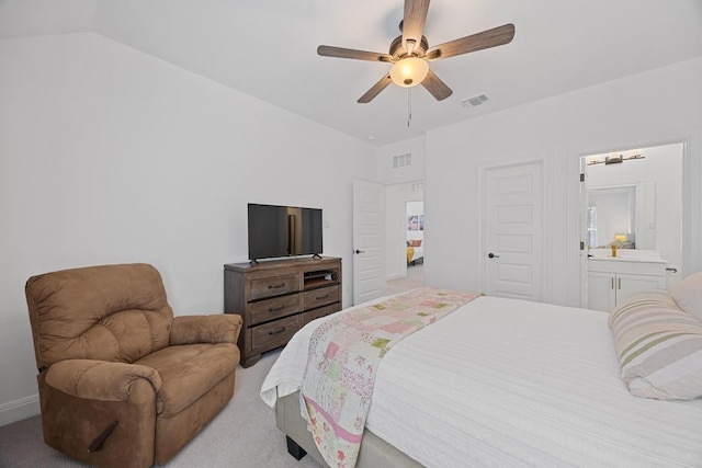 bedroom featuring visible vents, lofted ceiling, ceiling fan, and carpet flooring