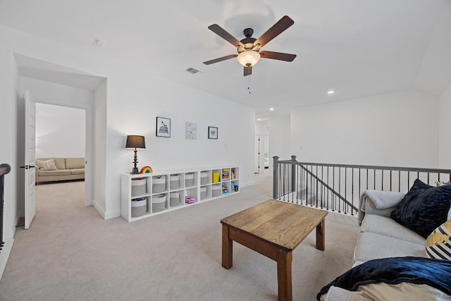 living area featuring baseboards, visible vents, carpet floors, recessed lighting, and ceiling fan