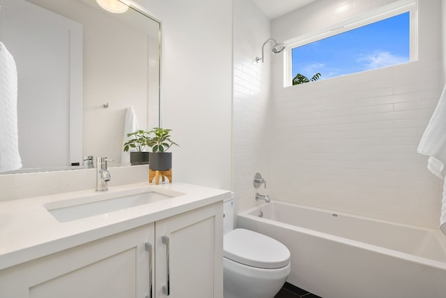 bathroom with vanity, toilet, and shower / bath combination