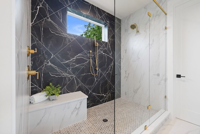 full bathroom with marble finish floor and a marble finish shower