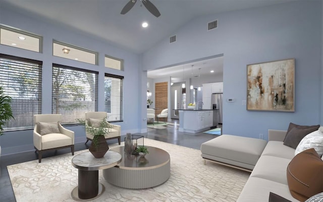 living area featuring recessed lighting, a ceiling fan, visible vents, and high vaulted ceiling