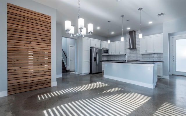 kitchen with dark countertops, visible vents, tasteful backsplash, stainless steel appliances, and wall chimney exhaust hood