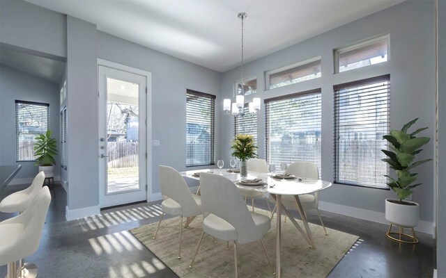 1128 Gunter St Unit B, Austin, TX 78702 - dining space with a chandelier, healthy amount of natural light, and baseboards