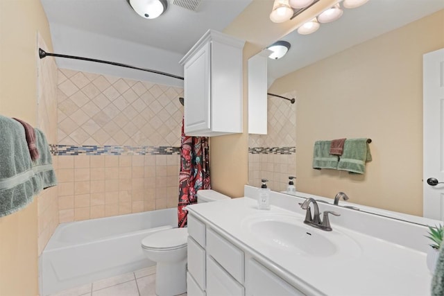 bathroom featuring tile patterned flooring, toilet, vanity, and shower / bath combo