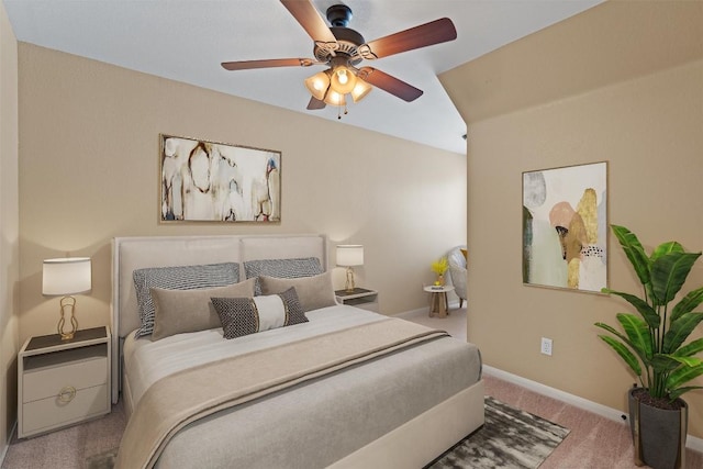 bedroom with a ceiling fan, carpet, and baseboards