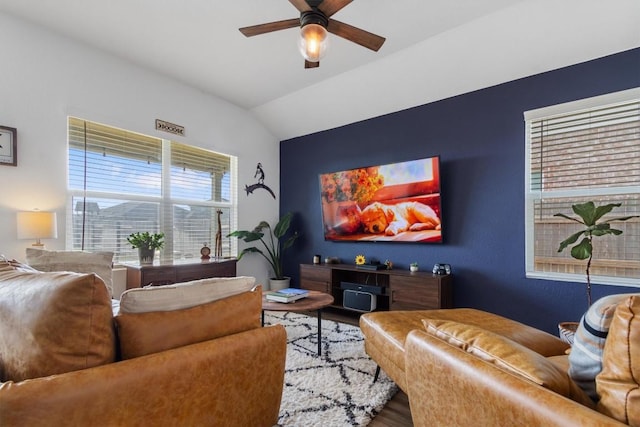 living room with vaulted ceiling, wood finished floors, and ceiling fan