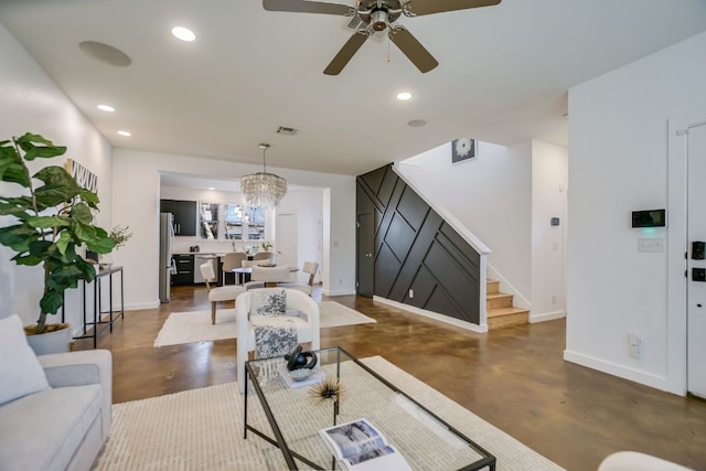 living area with visible vents, recessed lighting, baseboards, concrete flooring, and stairs