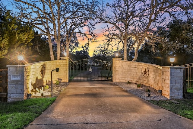 gate at dusk with fence