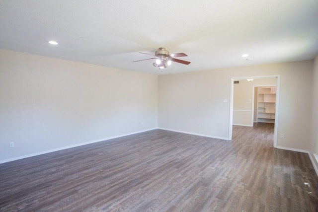 empty room with recessed lighting, baseboards, wood finished floors, and a ceiling fan