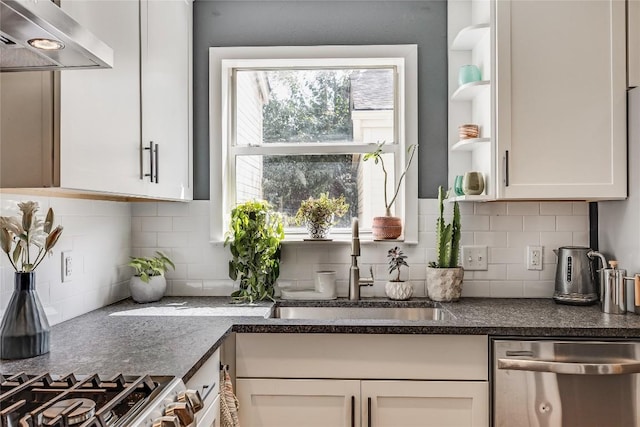 kitchen featuring open shelves, dark countertops, white cabinets, extractor fan, and dishwasher