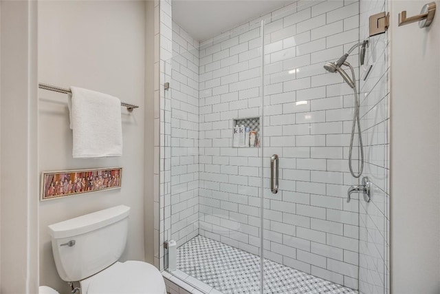 full bathroom featuring toilet and a stall shower