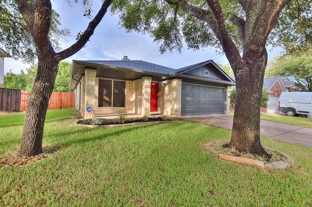 single story home featuring stone siding, fence, concrete driveway, an attached garage, and a front yard