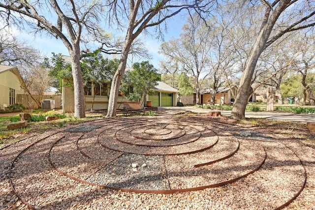 4711 Fieldstone Dr, Austin, TX 78735 - view of yard with an attached garage