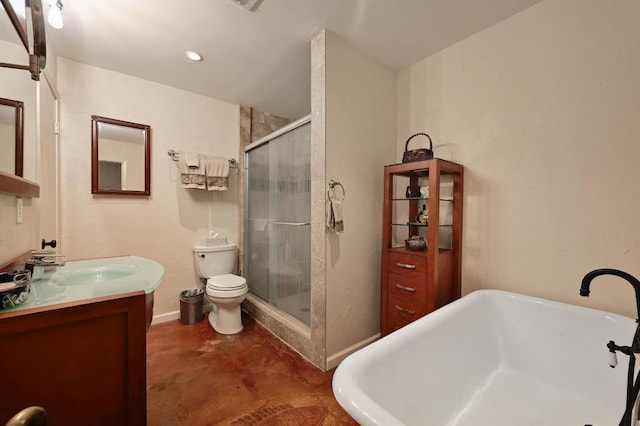 full bathroom featuring vanity, a freestanding tub, a stall shower, concrete flooring, and toilet