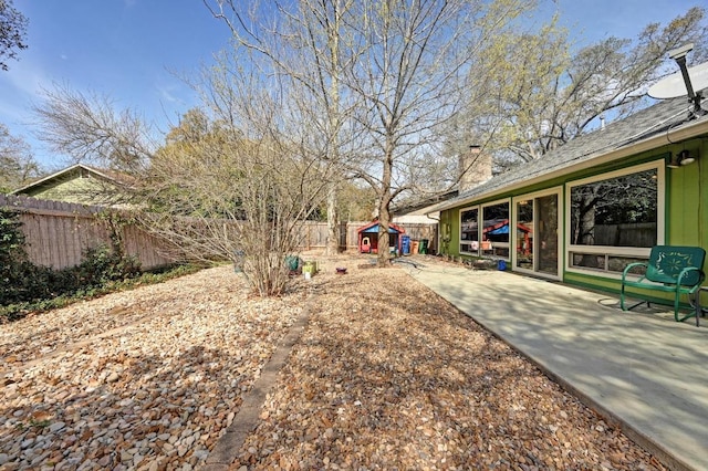 view of yard featuring a fenced backyard and a patio area