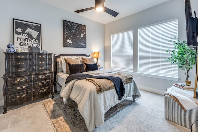 carpeted bedroom featuring a ceiling fan