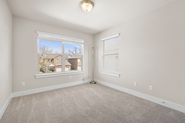 1050 Kenney Fort Xing Unit 24, Round Rock, TX 78665 - carpeted empty room with baseboards