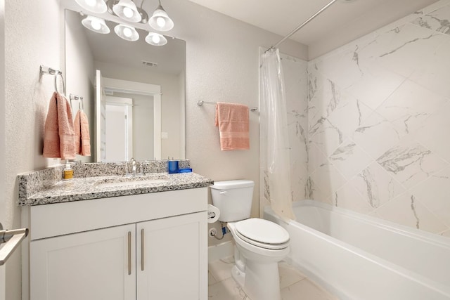 full bathroom featuring toilet, shower / bath combo, a textured wall, marble finish floor, and vanity