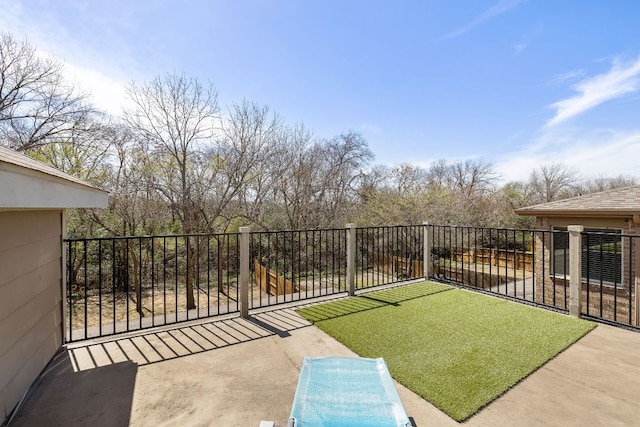 view of patio featuring fence