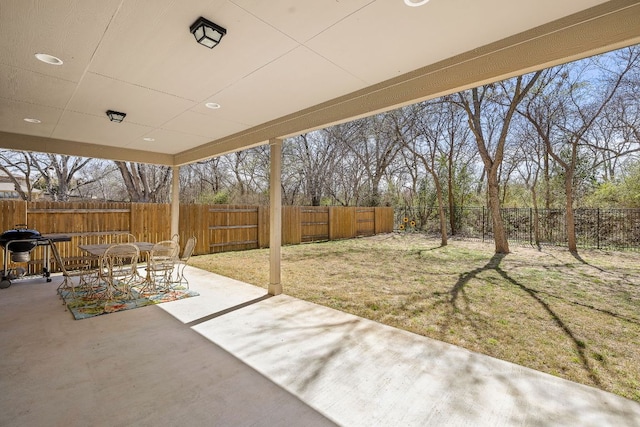 view of patio / terrace featuring outdoor dining area and a fenced backyard