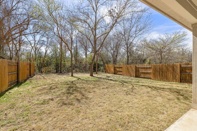 1050 Kenney Fort Xing Unit 24, Round Rock, TX 78665 - view of fenced backyard