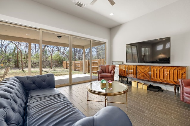 living area featuring recessed lighting, wood finished floors, visible vents, and ceiling fan